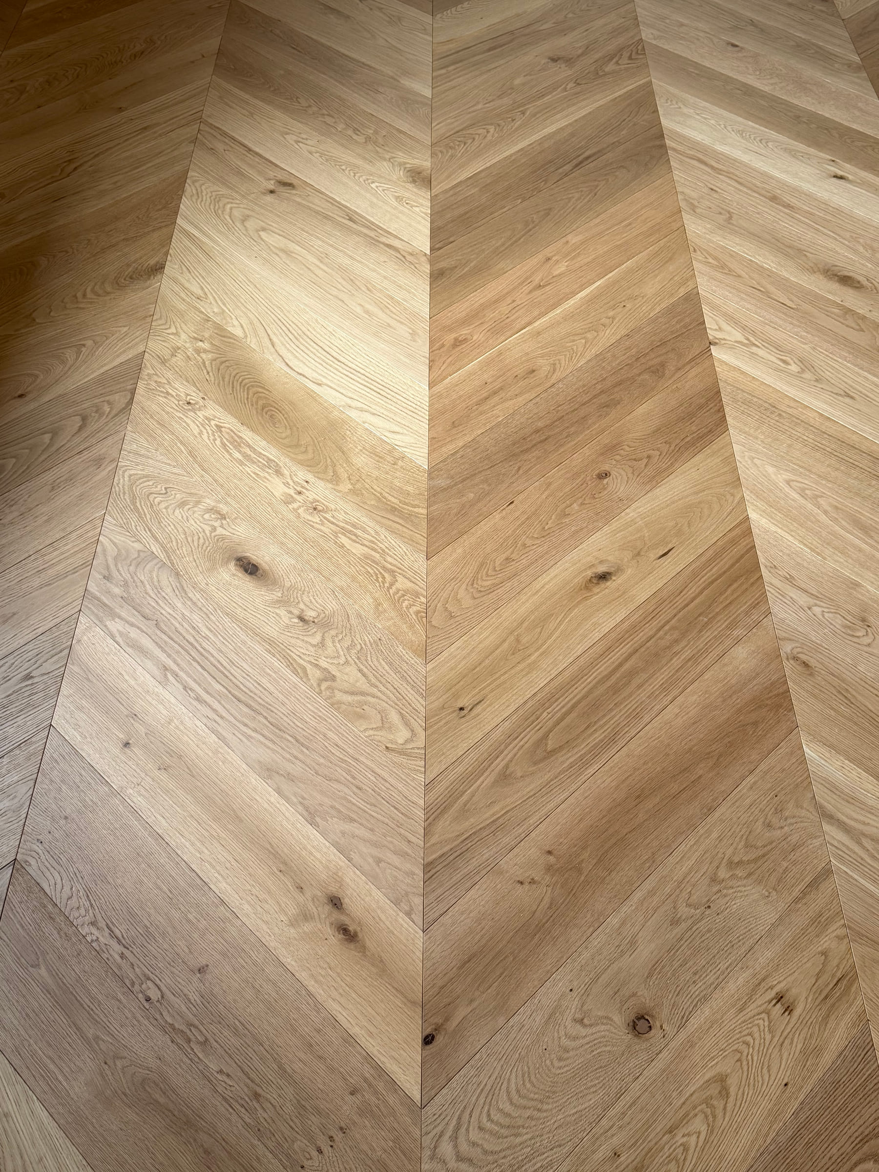 Close view of the aligned Natural Oak engineered oak chevron pattern in Bulleen.