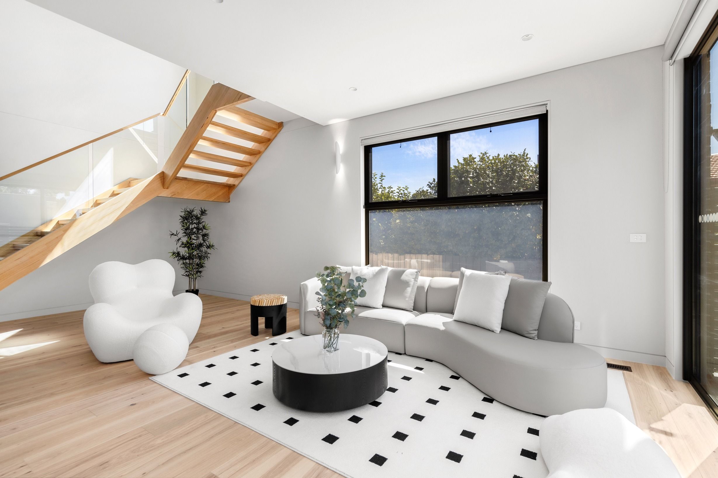 Danehill engineered Hickory flooring across a sunlit Wheelers Hill living room.