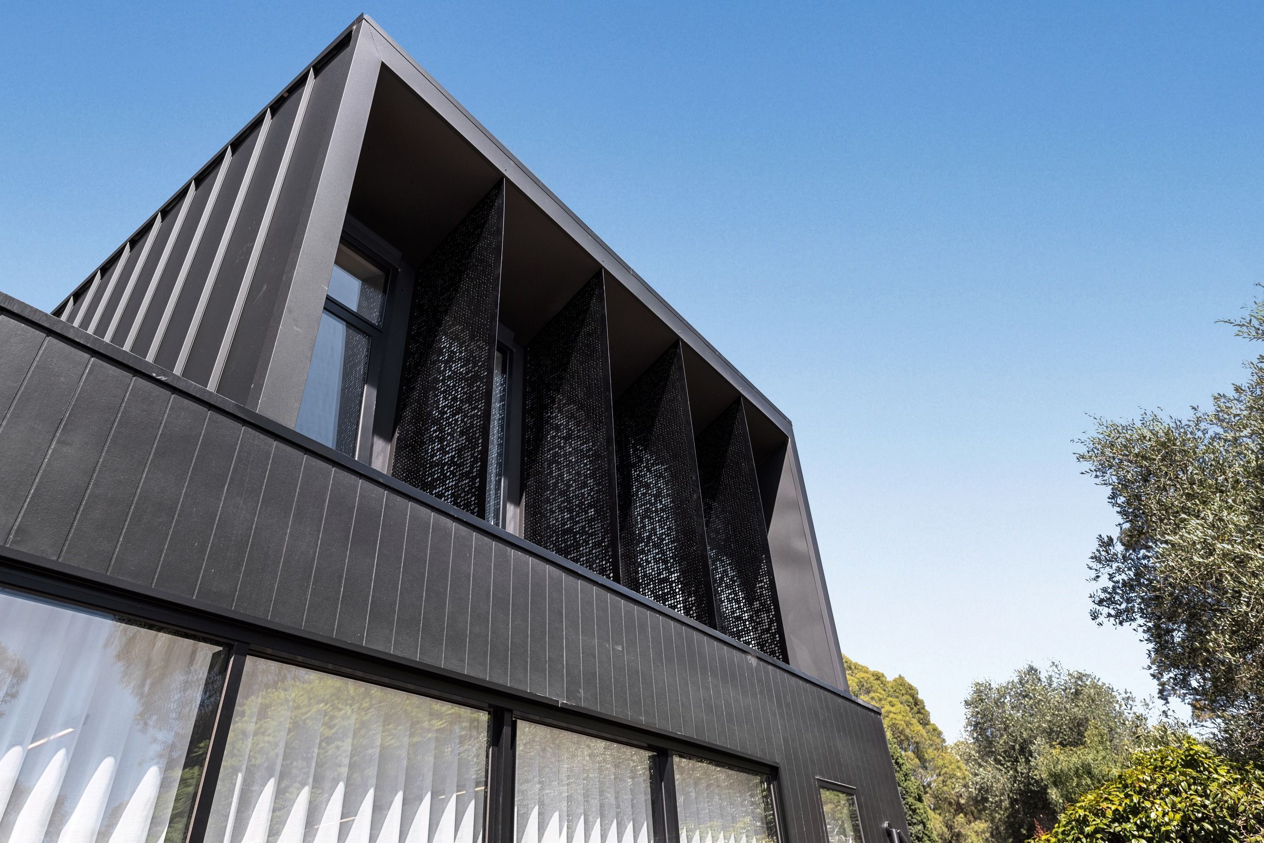 Upper exterior detail of the completed Glen Iris residence.