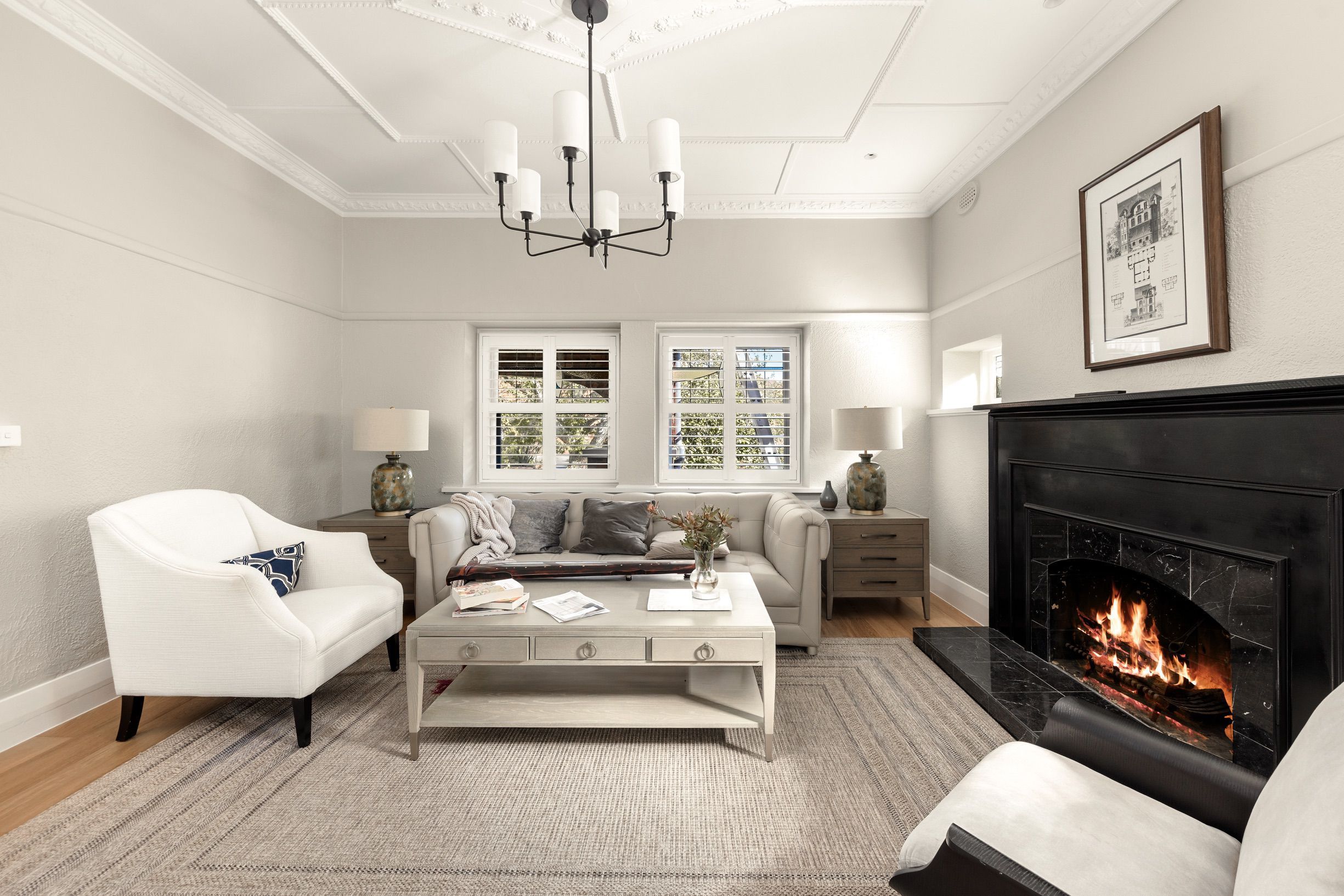Chesterfield engineered oak flooring in a Canterbury lounge with fireplace.