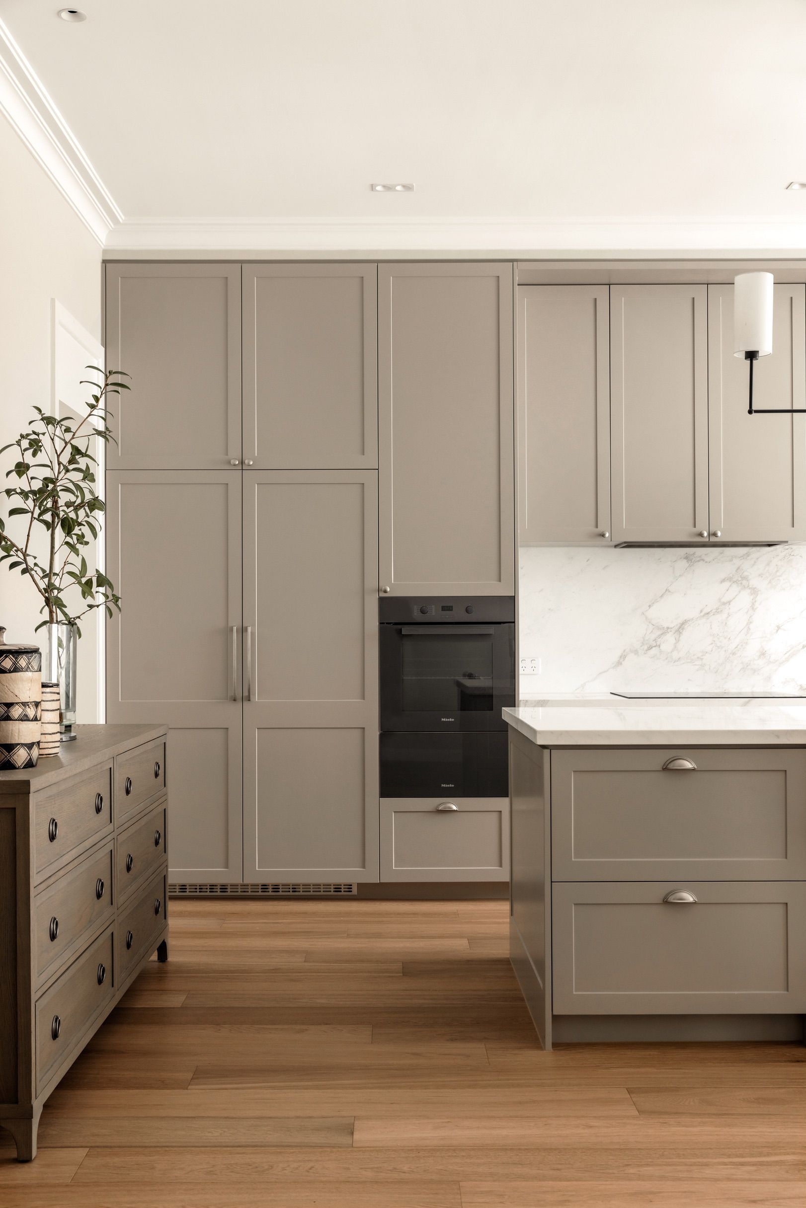 Chesterfield engineered oak flooring leading into a Canterbury kitchen.