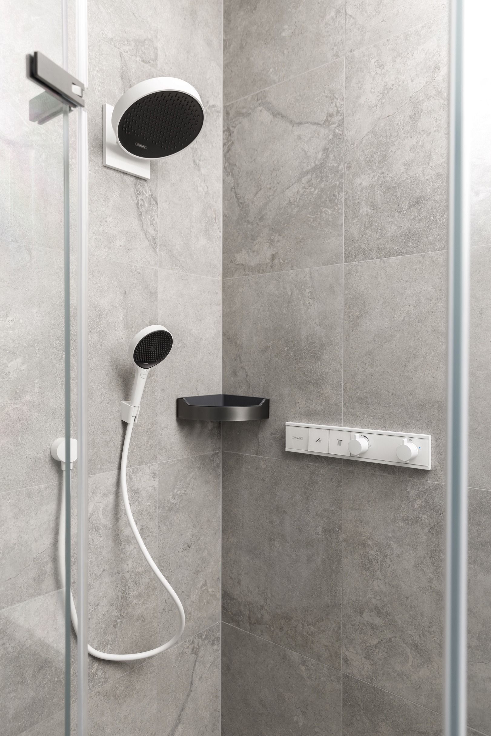 Grey-tiled shower detail in the completed Kew residence.