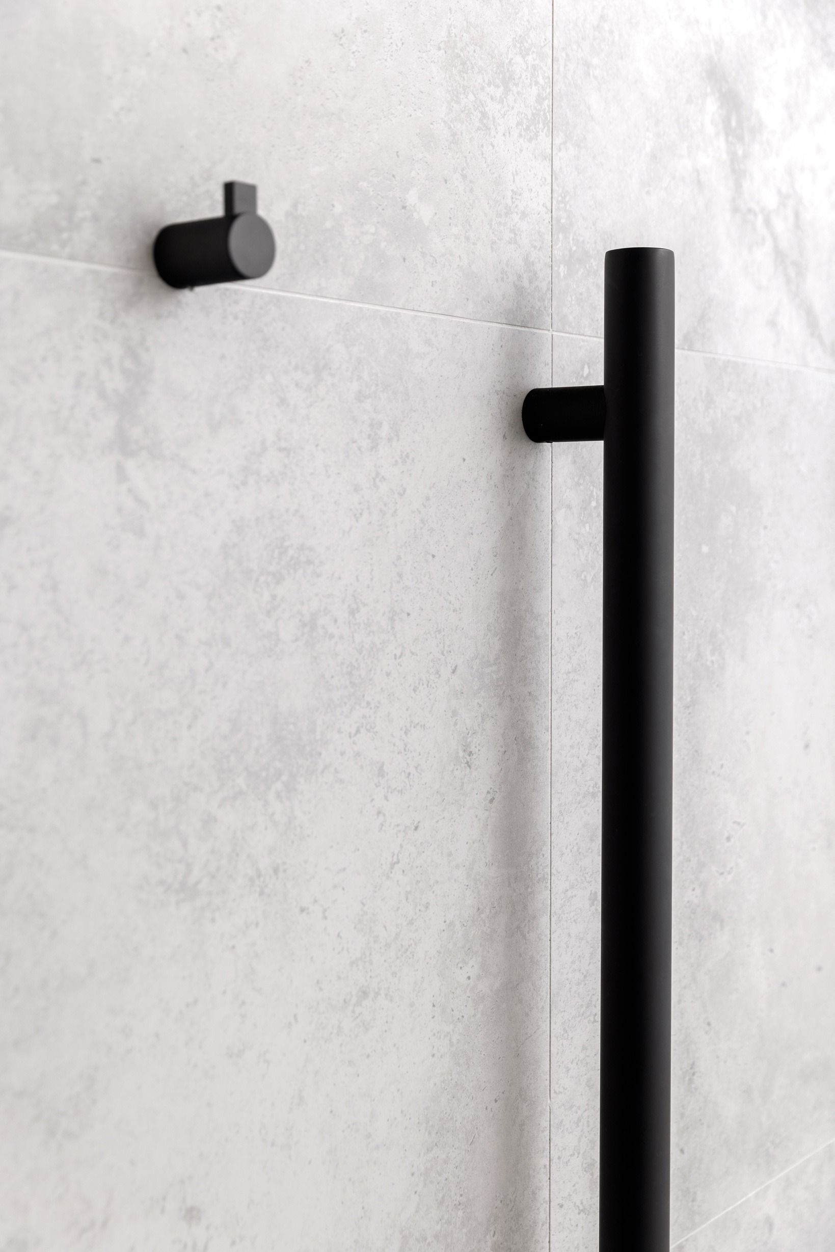 Black bathroom fixture detail in the completed Glen Iris residence.