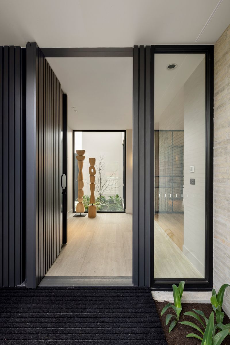 Entry view into a Kew residence finished with Avoca Bay engineered oak flooring.