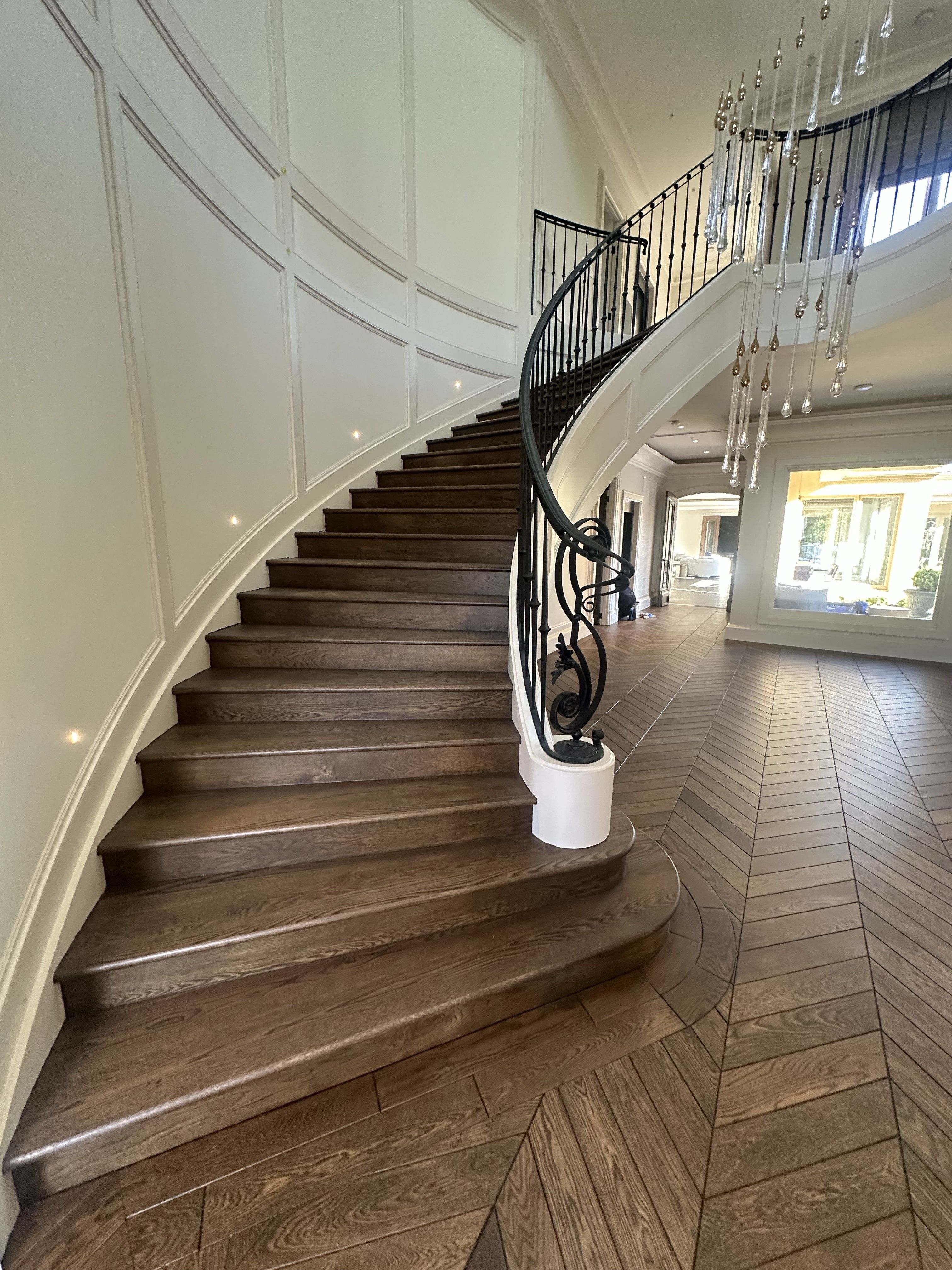 Solid oak chevron flooring and coordinated timber staircase in Balwyn North.