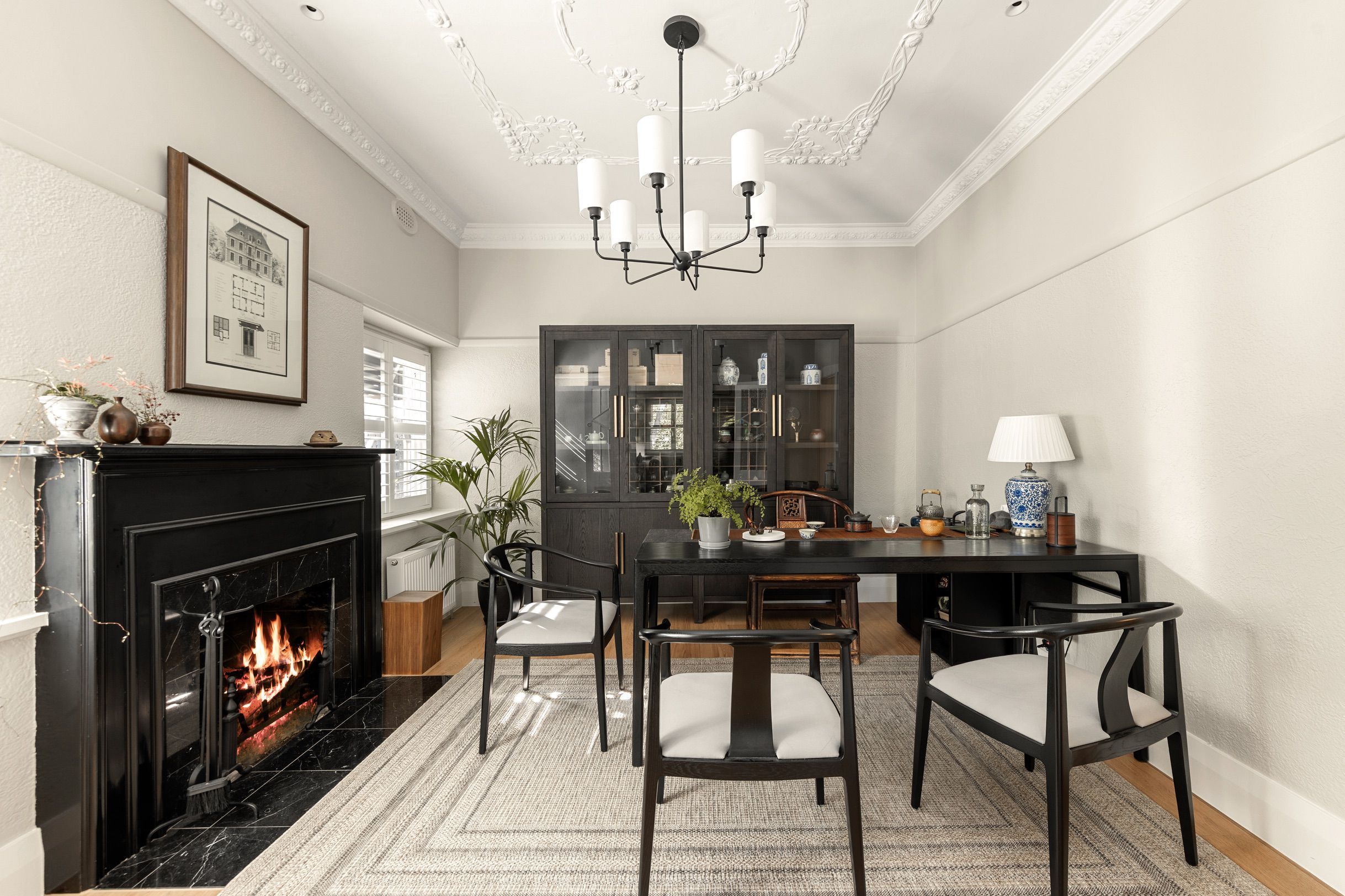 Chesterfield oak flooring in a Canterbury dining room with dark fireplace.