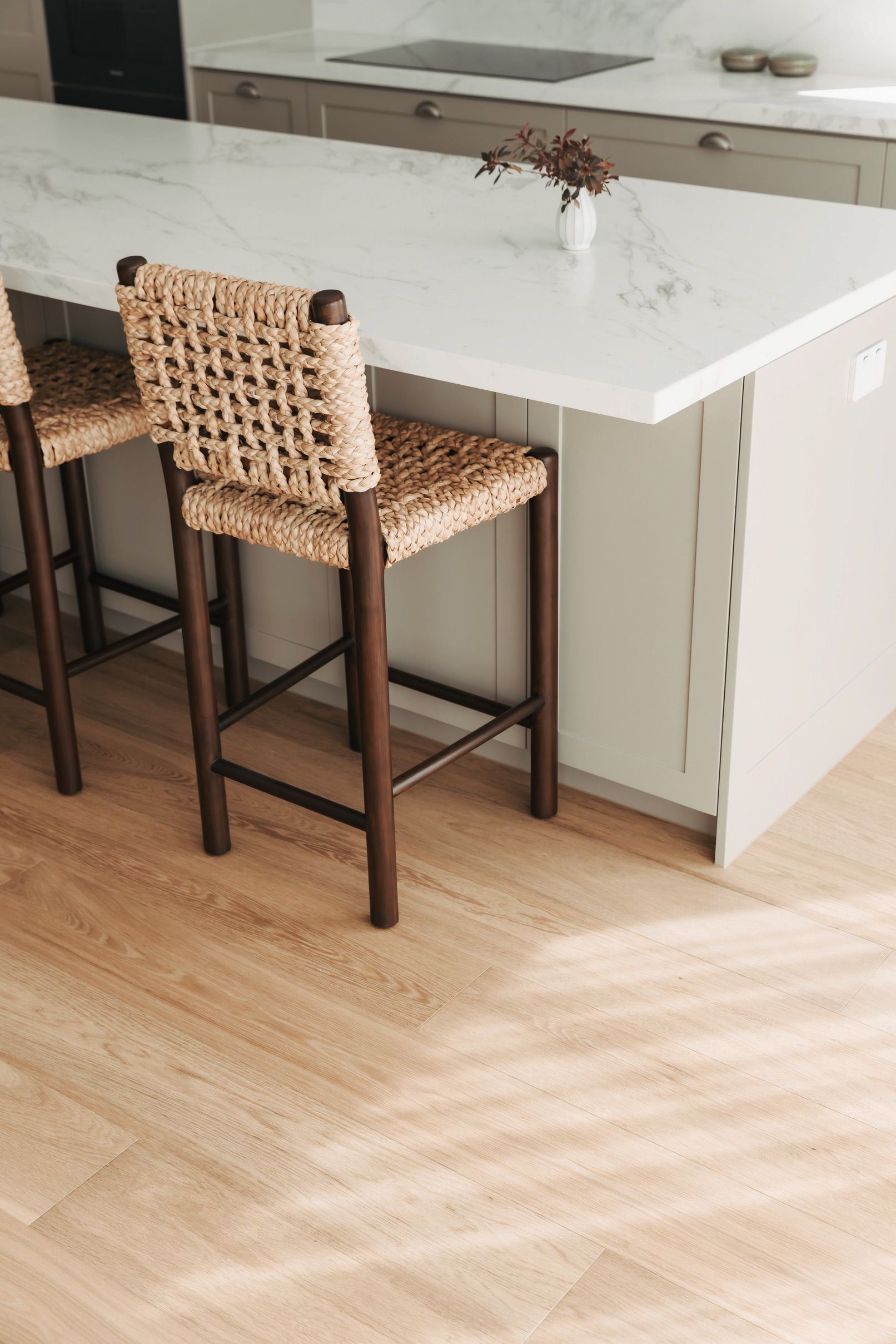 Chesterfield oak plank detail beside a Canterbury kitchen island.