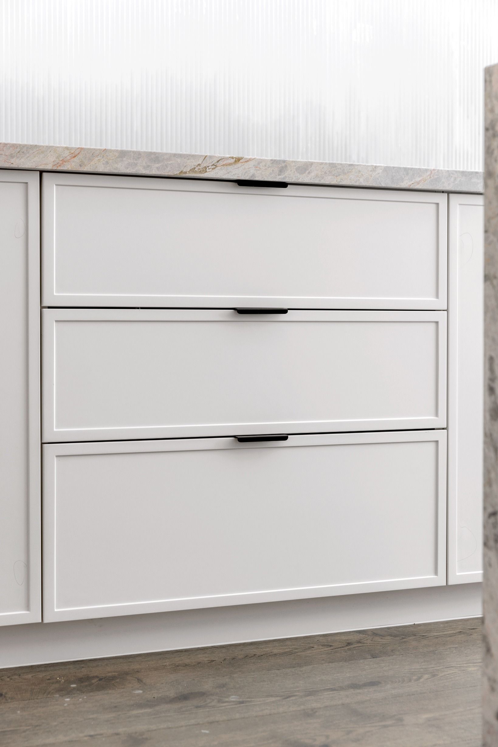 Grey kitchen drawer detail in the completed Glen Iris residence.