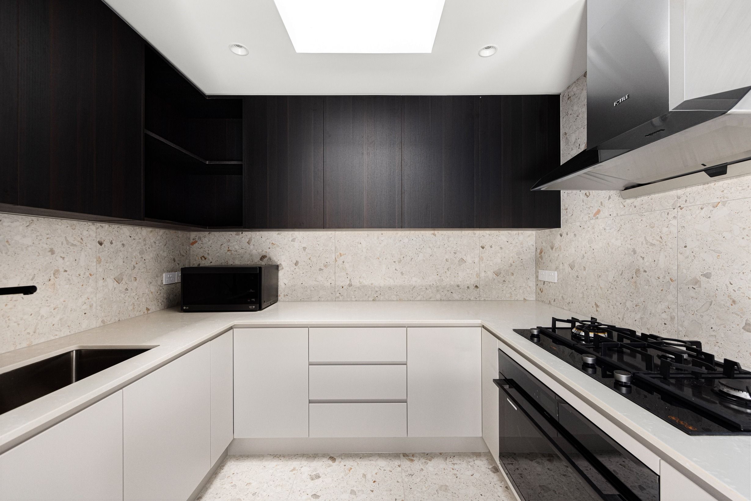 Black and white kitchen detail in the completed Wheelers Hill residence.
