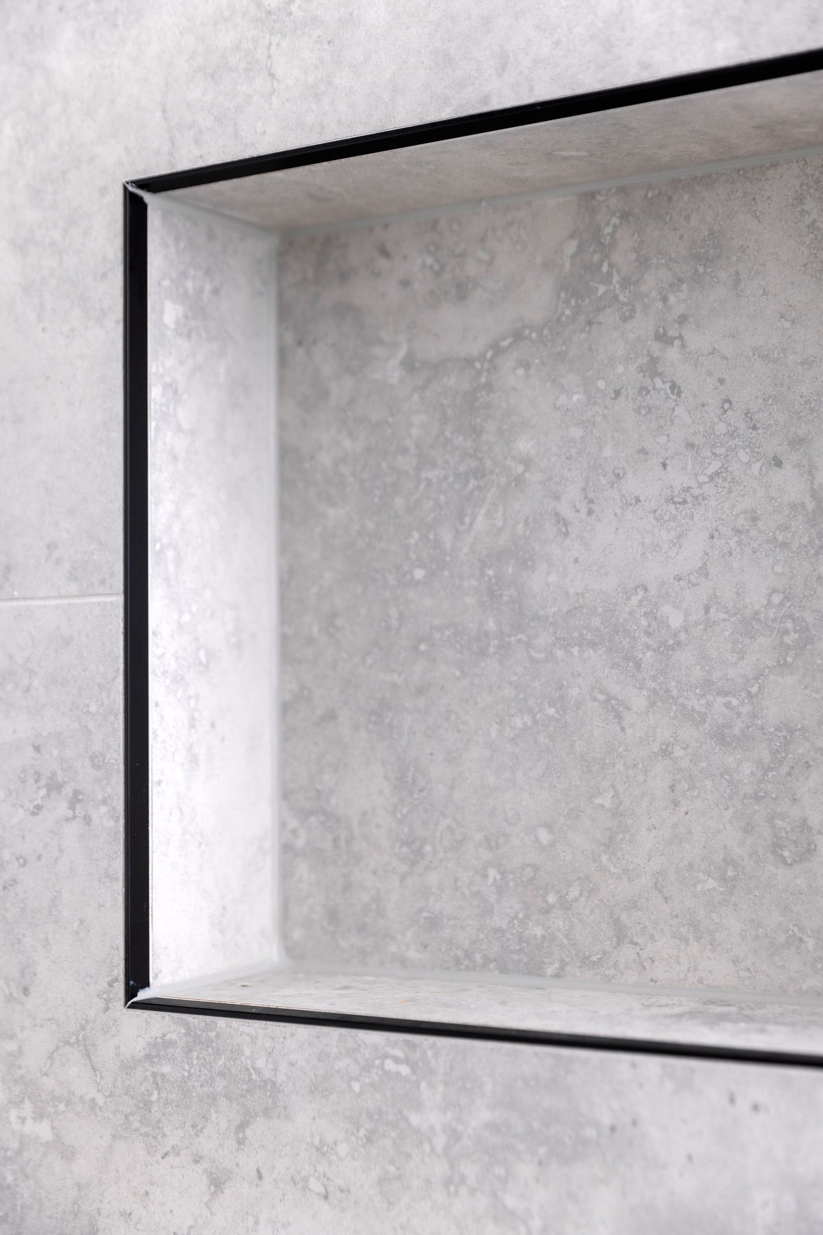 Recessed bathroom shelf detail in the completed Glen Iris residence.