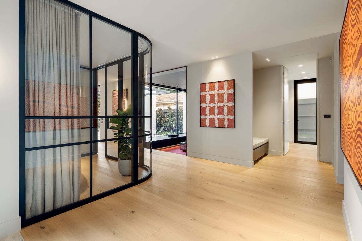 Avoca Bay oak flooring connecting a Kew hallway and glazed office.