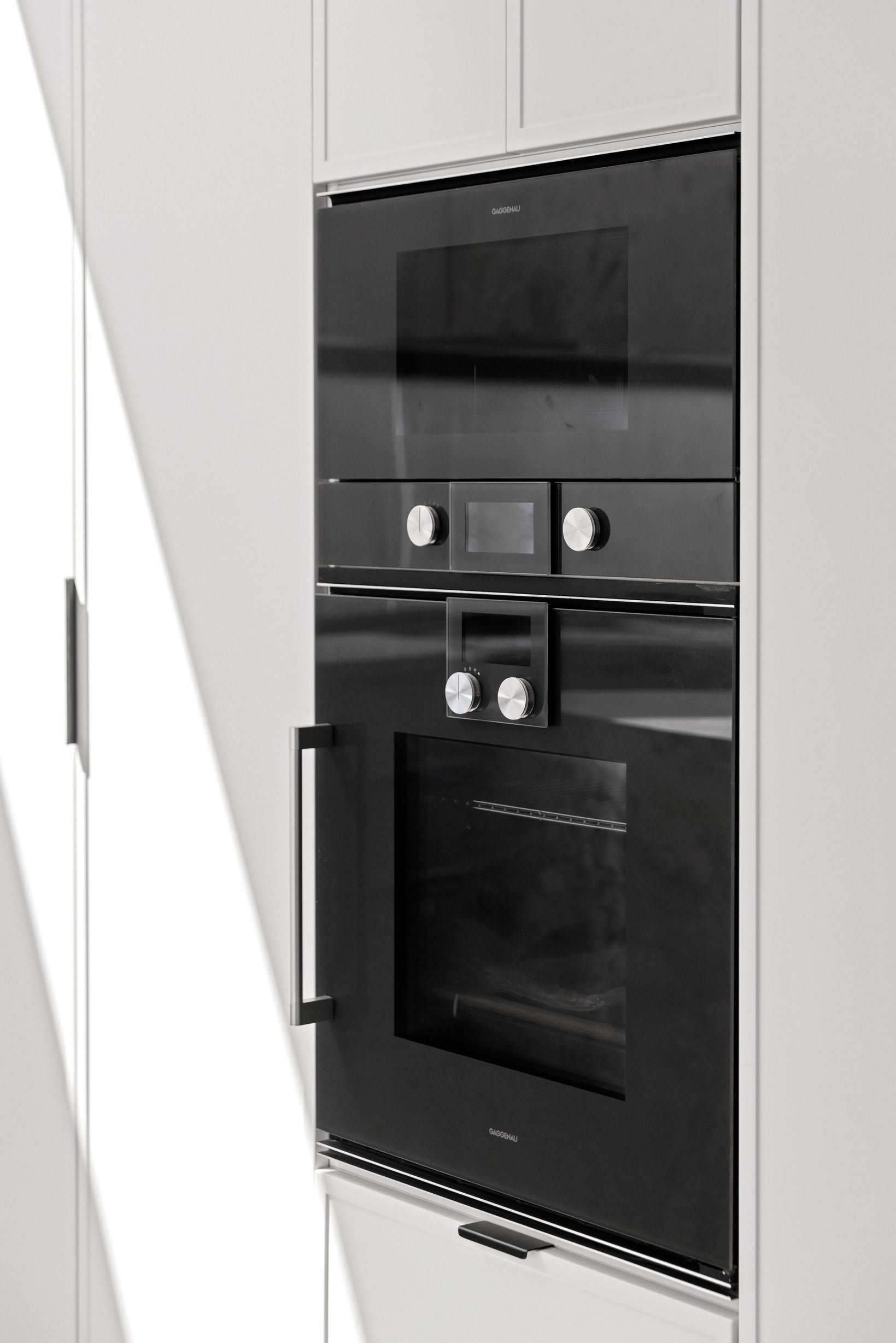 Integrated kitchen appliance detail in the Glen Iris residence.