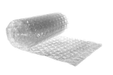 A roll of clear bubble wrap partially unrolled on a white background.
