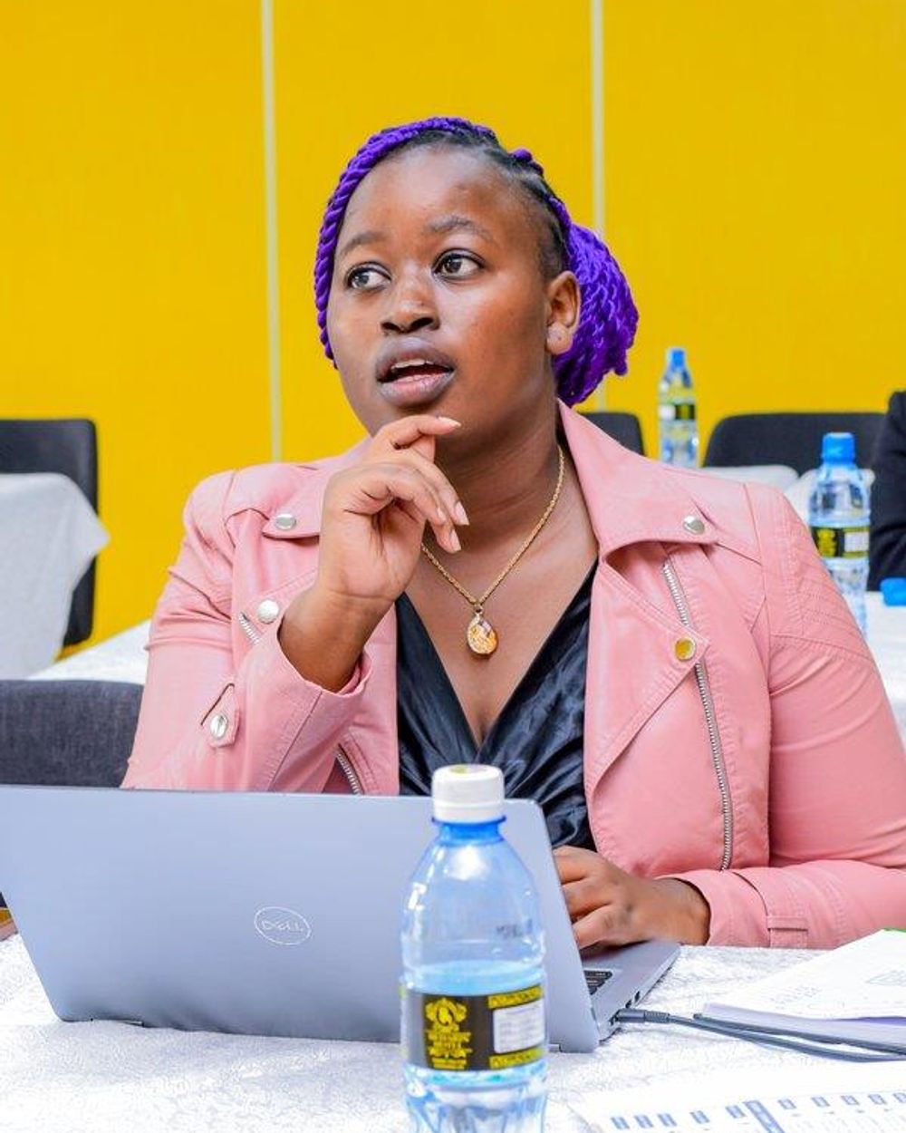 Candid attendee listening intently at a business seminar