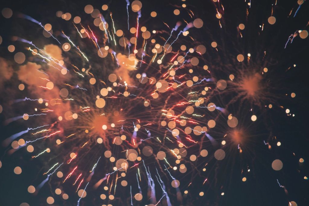 a close up of a fireworks display in the night sky