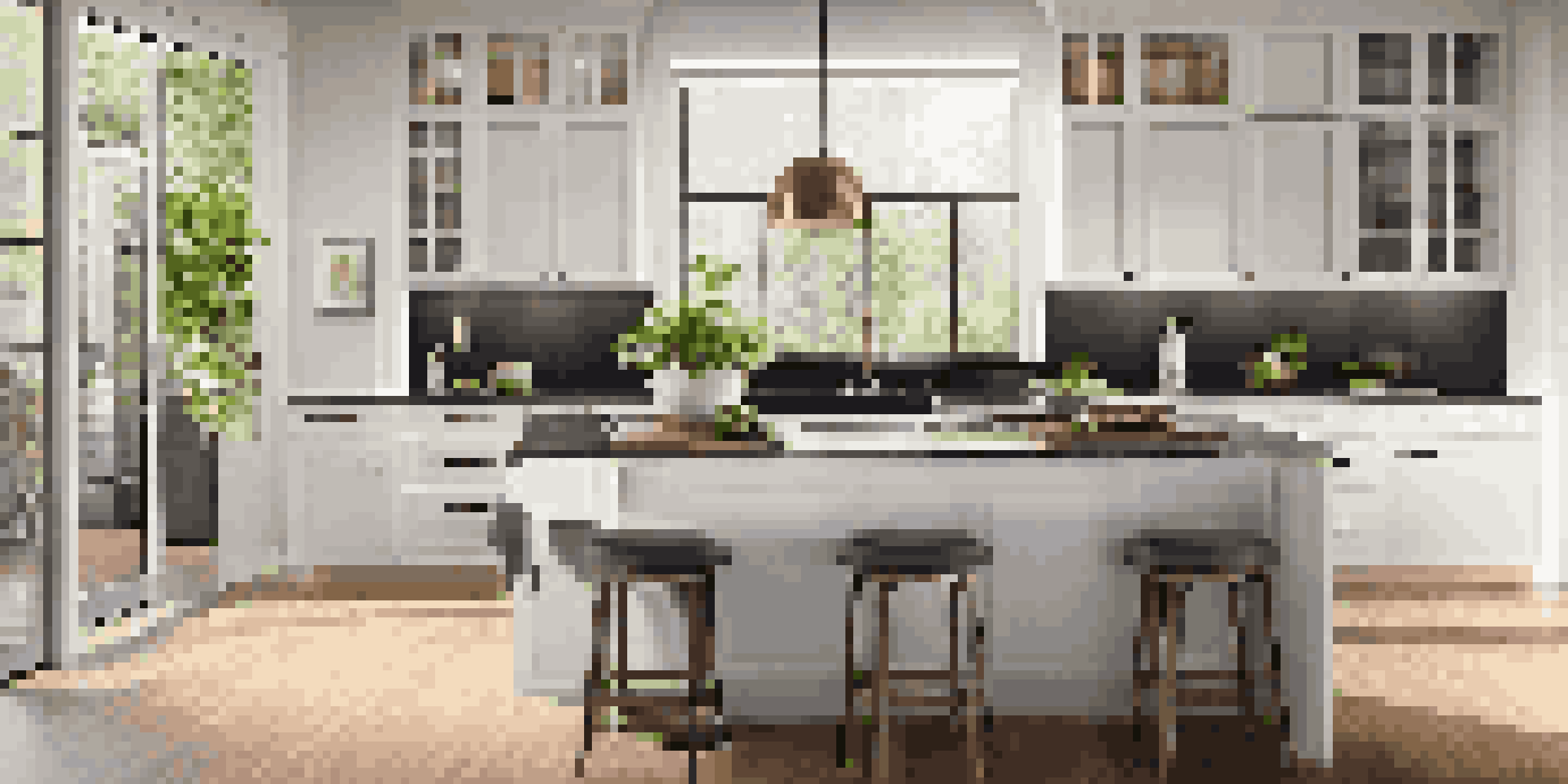 A modern kitchen with white cabinets, a granite island, and stainless steel appliances, illuminated by natural light from a window.