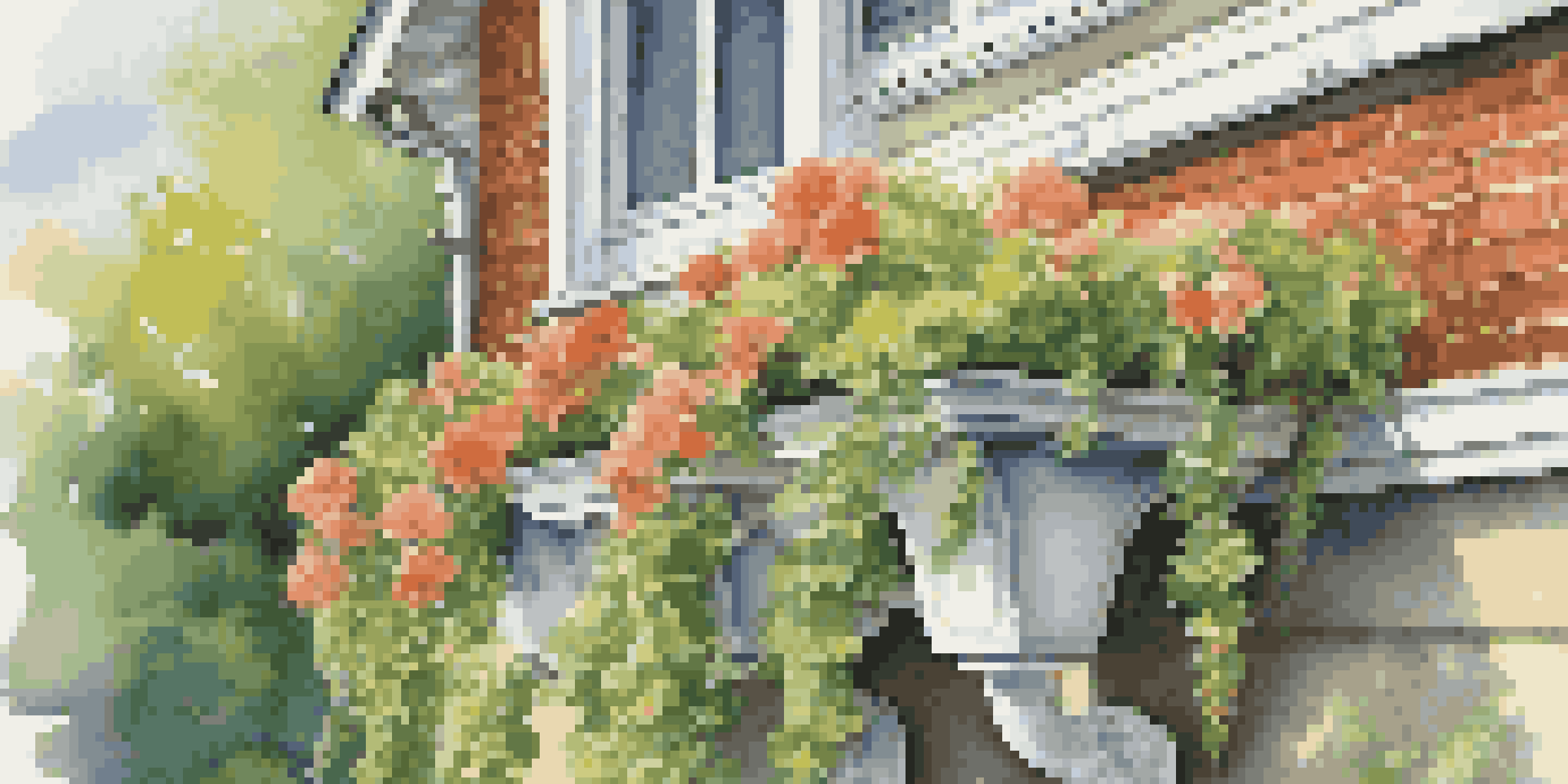Close-up of clear gutters with water flowing, surrounded by fresh green leaves and flowers, under a bright blue sky.