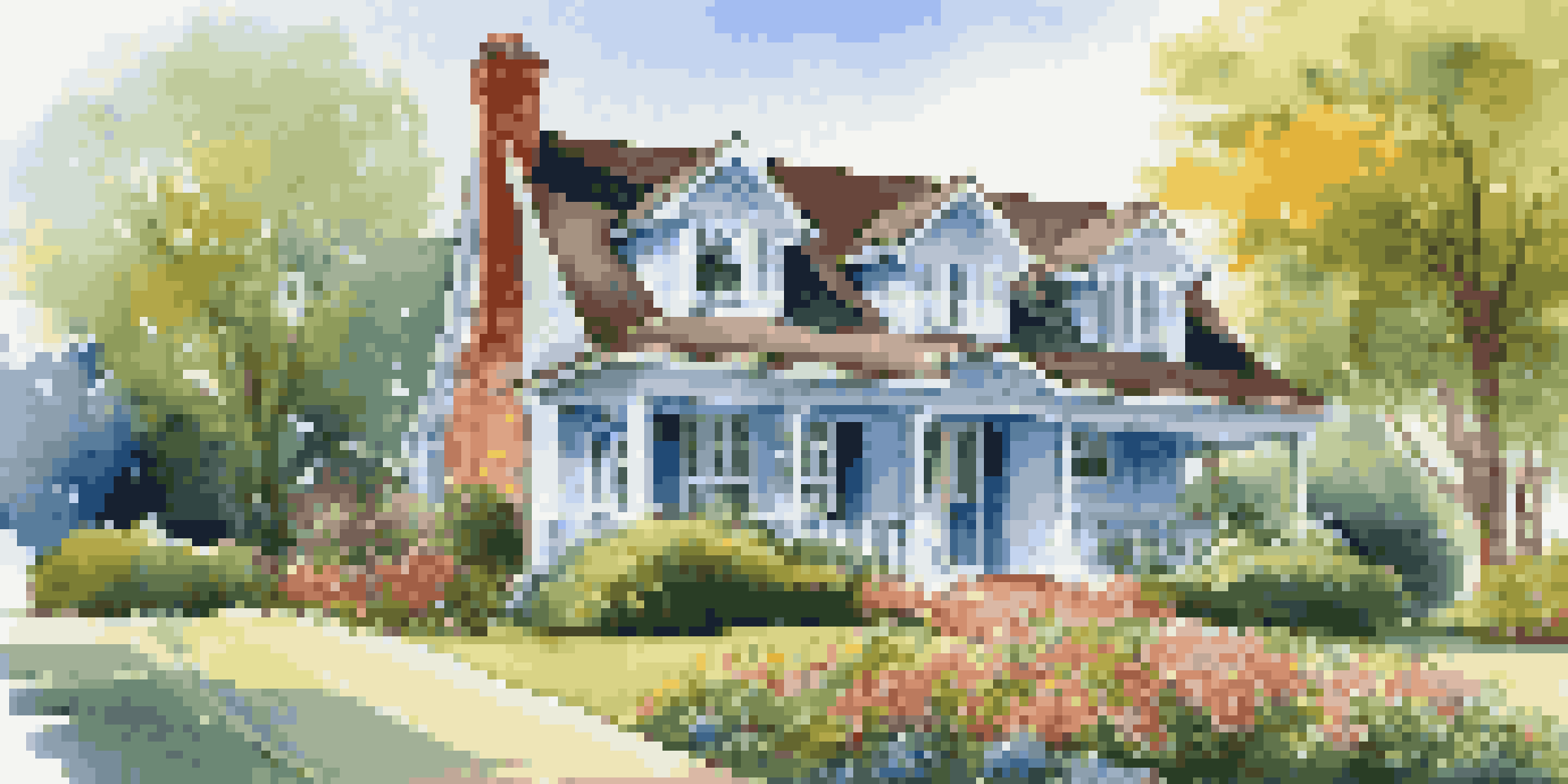 A charming house with a vibrant garden and new roof under a blue sky.
