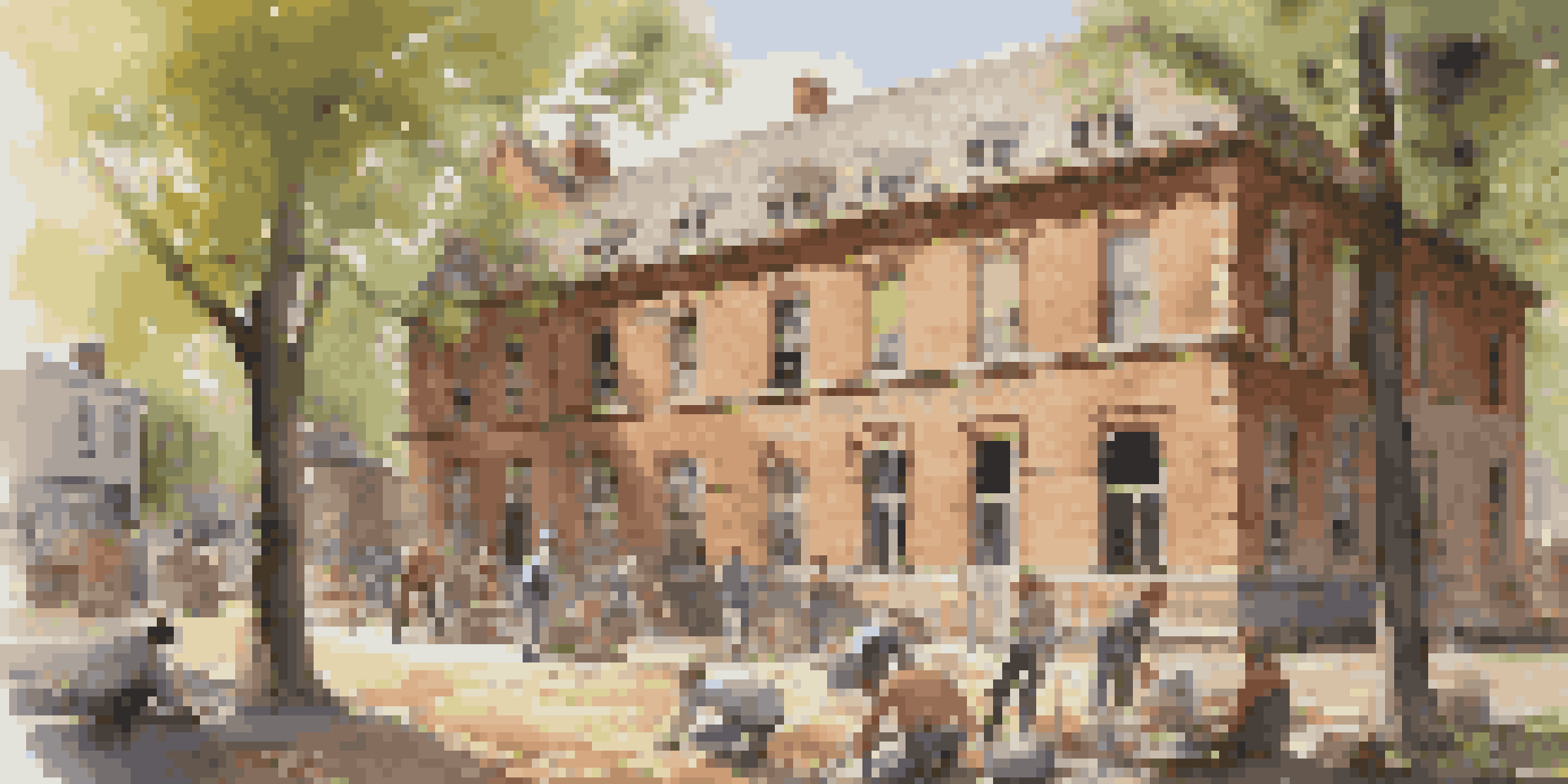 A diverse group of people working together to restore a historic building in a community workshop, with tools and warm sunlight filtering through trees.