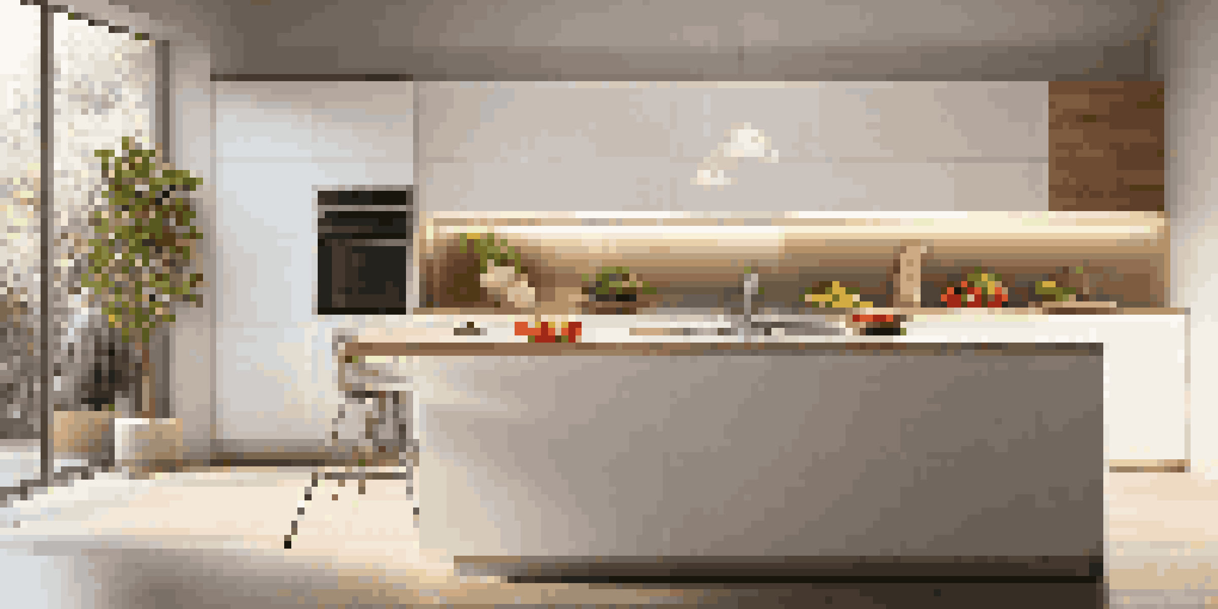 A modern kitchen with warm LED lighting under the cabinets, featuring a countertop with colorful fruits and vegetables, and stainless steel appliances.