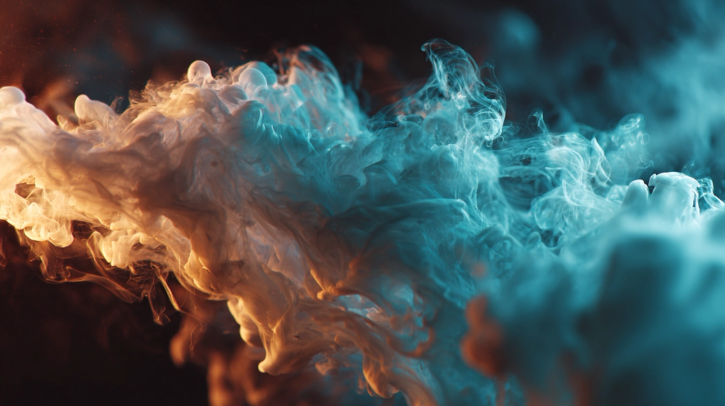 The image depicts a swirling cloud of colorful smoke, blending shades of orange and blue. It creates a dynamic and ethereal atmosphere, with the smoke appearing to flow and intertwine gracefully.
