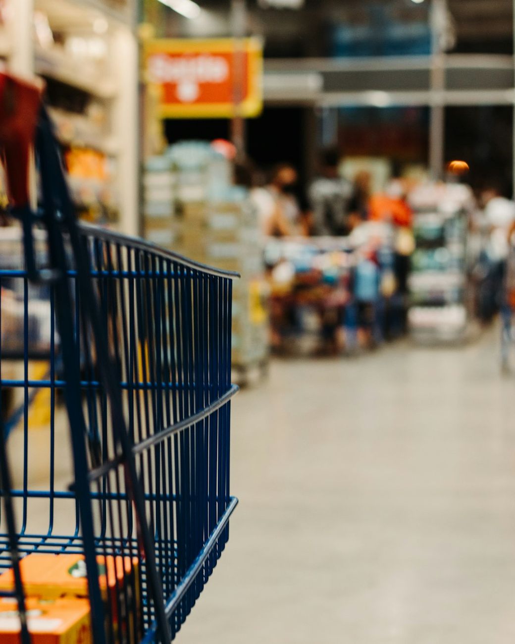 supermarket cart on aisle — Credit: Photo by Eduardo Soares on Unsplash