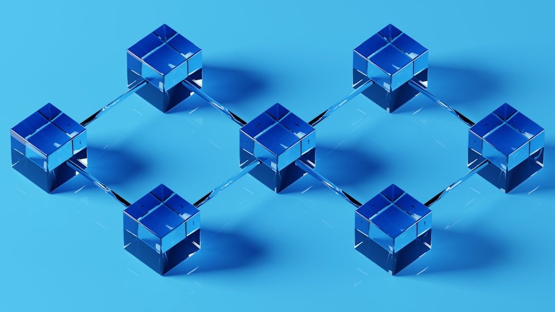 The image features a 3D representation of interconnected cubes arranged in a network structure, set against a blue background. This design symbolizes connectivity and data flow, often associated with blockchain technology.