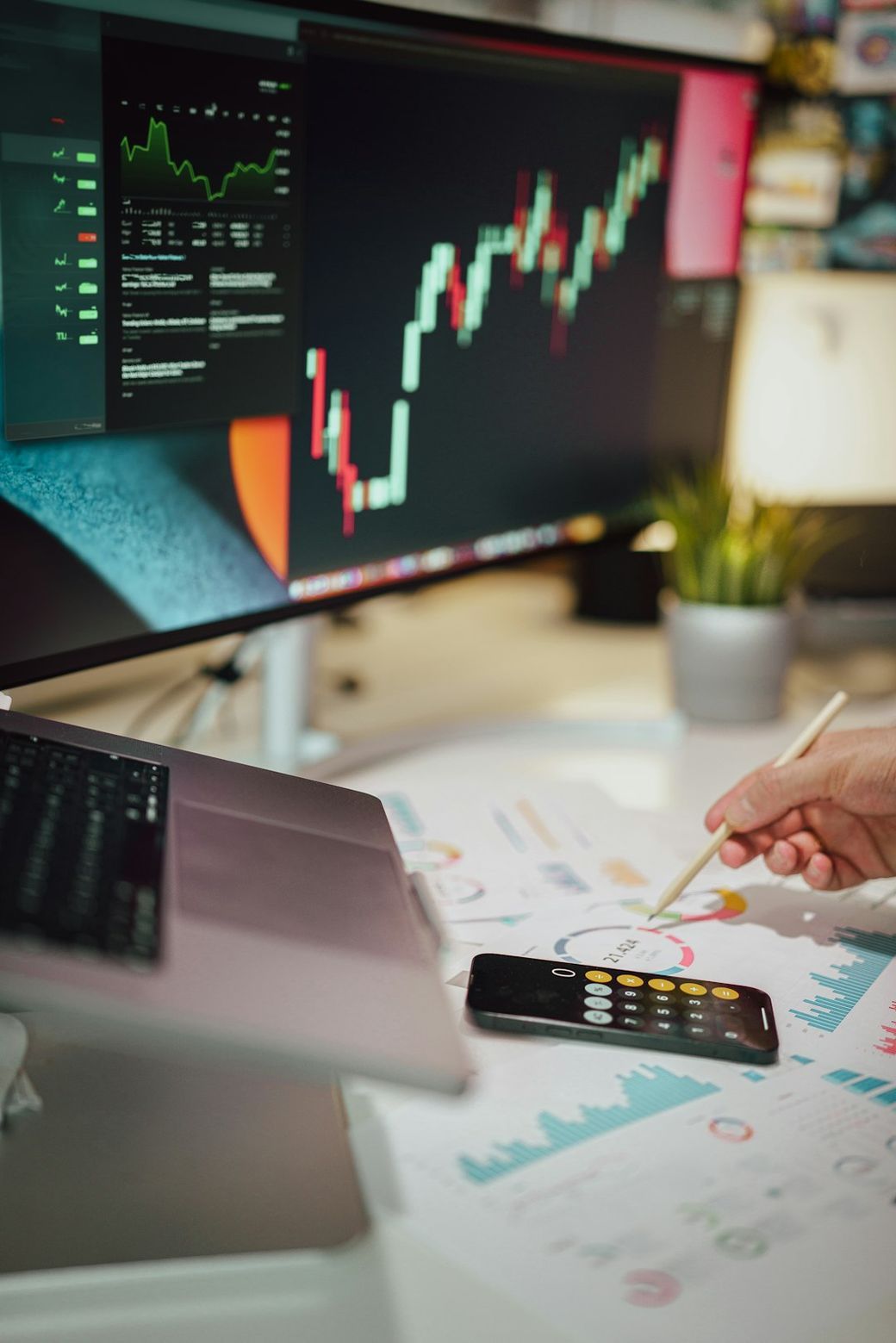 Currencies and finance. Stock exchange. Calculator on the table — Credit: Photo by Jakub Żerdzicki on Unsplash