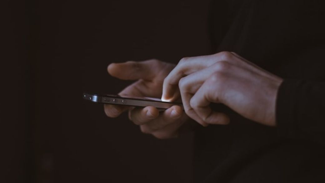 man on a smartphone — Credit: Photo by Gilles Lambert on Unsplash