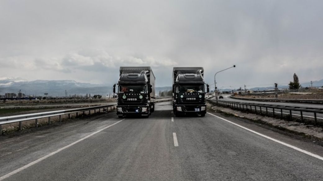 Trucks on the highway — Credit: Photo by İsmail Enes Ayhan on Unsplash