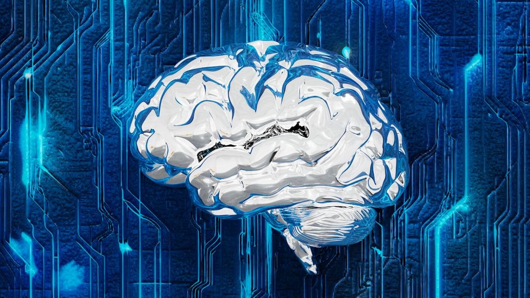 The image features a stylized representation of a human brain rendered in metallic silver, set against a backdrop of blue circuit patterns. This juxtaposition suggests a theme of technology and artificial intelligence. — Credit: Photo by Ecliptic Graphic on Unsplash