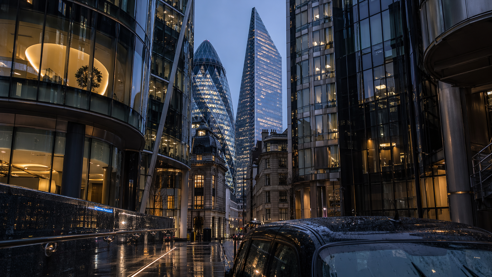 The image showcases a modern cityscape featuring sleek skyscrapers with glass facades, reflecting twilight hues. A street with a parked vehicle is visible in the foreground, highlighting the urban architecture and atmosphere.