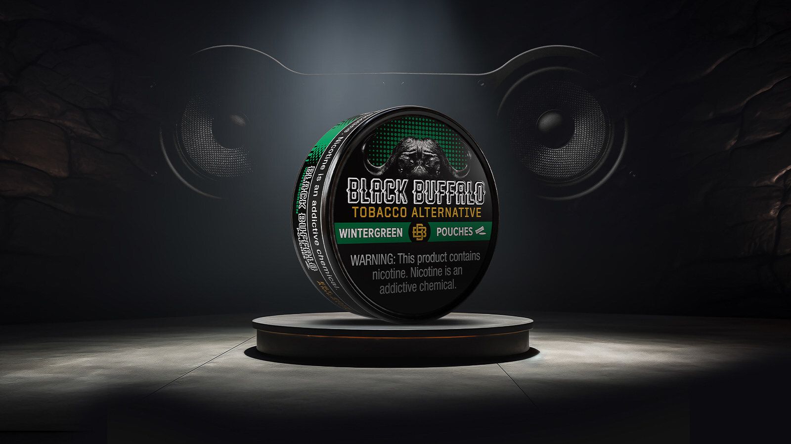 The image features a prominently displayed can of Black Buffalo Wintergreen tobacco alternative on a circular platform with a dramatic backdrop. The setting is illuminated, emphasizing the product's branding.