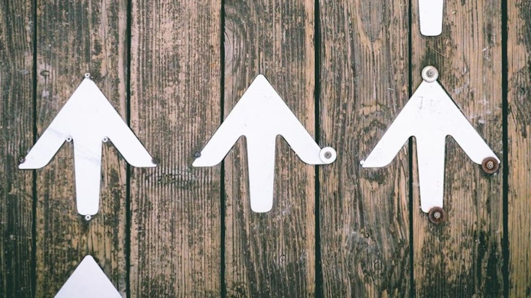 Upwards arrows — Credit: Photo by Jungwoo Hong on Unsplash