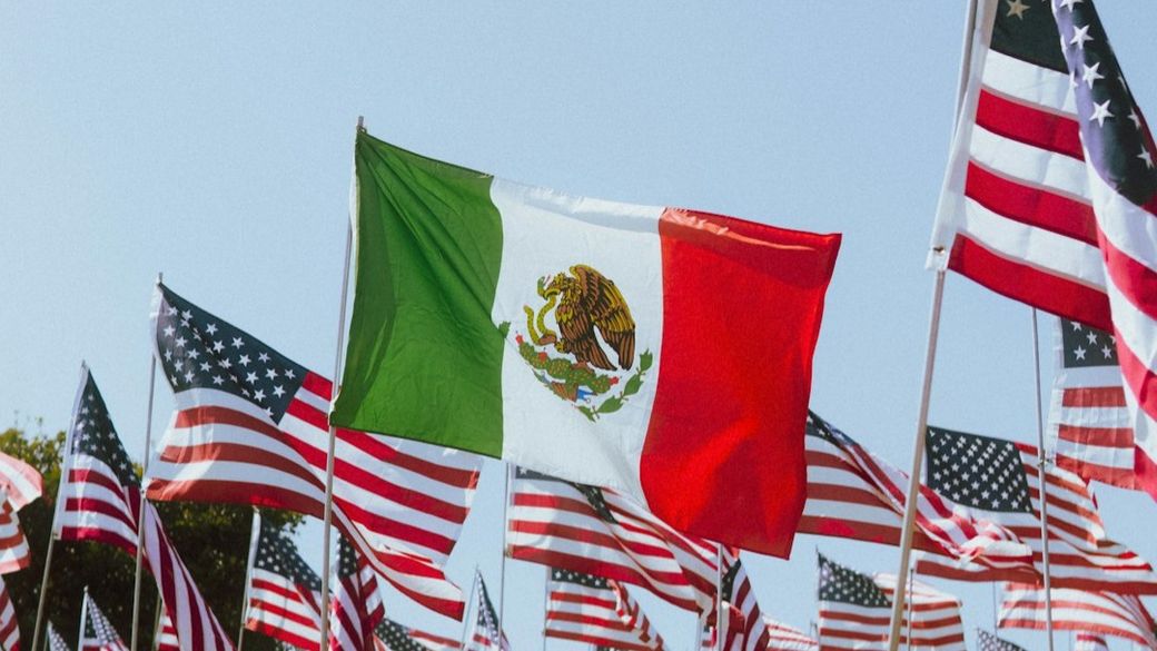 The Mexican Flag at the annual Waves of Flags event at Pepperdine University — Credit: Photo by Esteban Bonilla on Unsplash