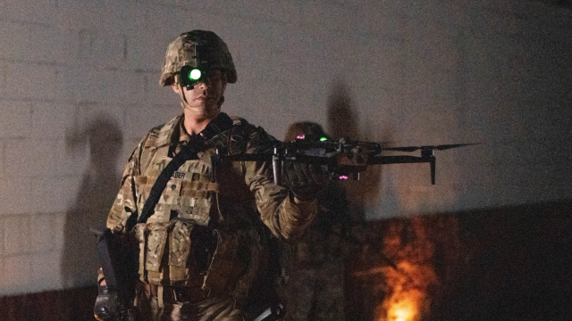 Soldier launching a Skydio X10D drone for a night autonomous mission