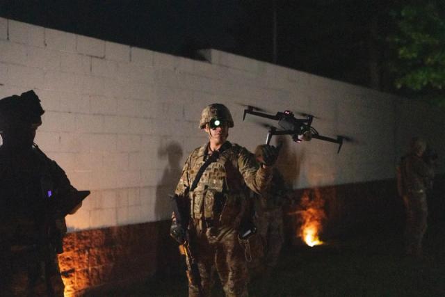 Troops launching X10D at night using Nightsense autonomy feature