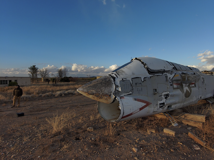 Photograph of an abandoned Corsair Jet.