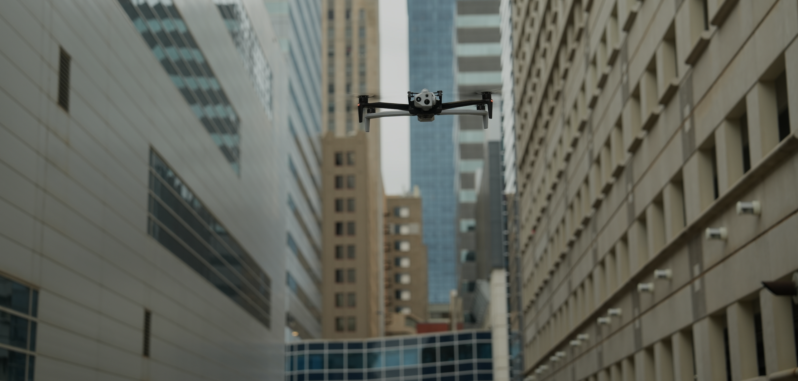 Skydio X10 Drone in flight in urban city landscape view