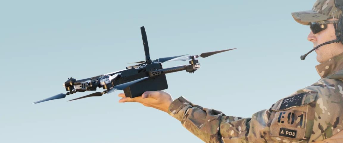 Soldier launching Skydio X2D drone from thier hand 
