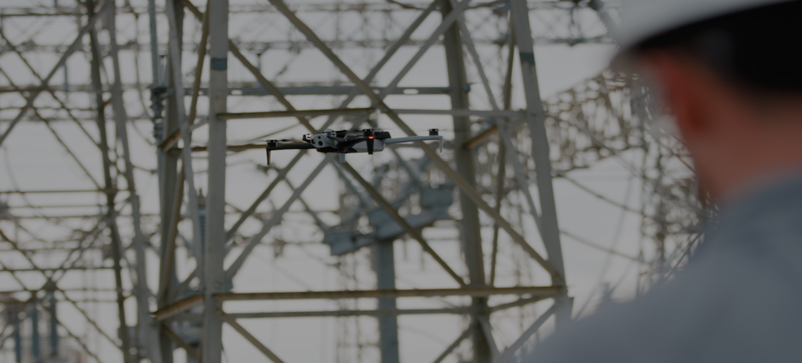 AEP worker using Skydio X10 to navigate and inspect large substation