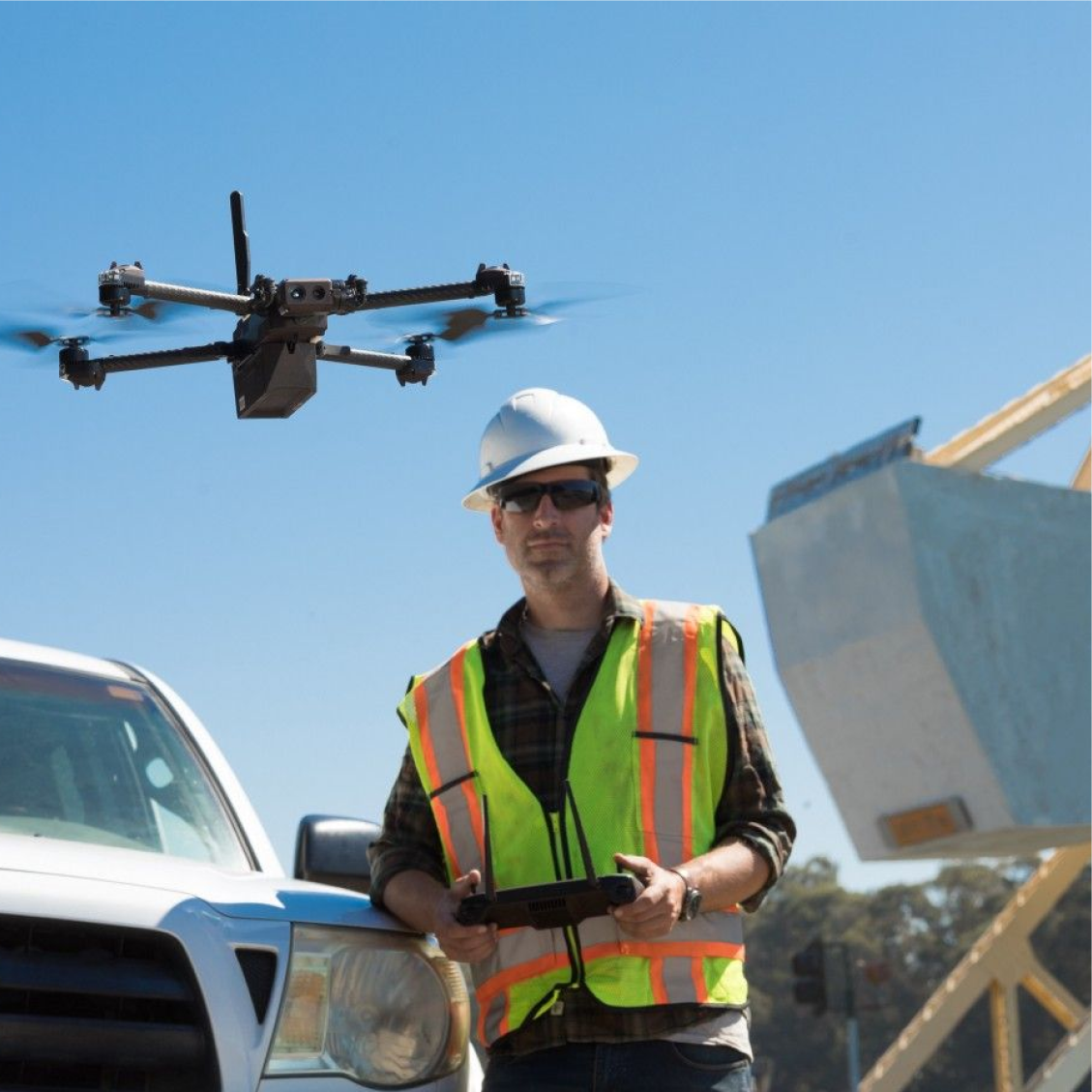 Construction drone pilot flying skydio