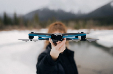 Person holding drone