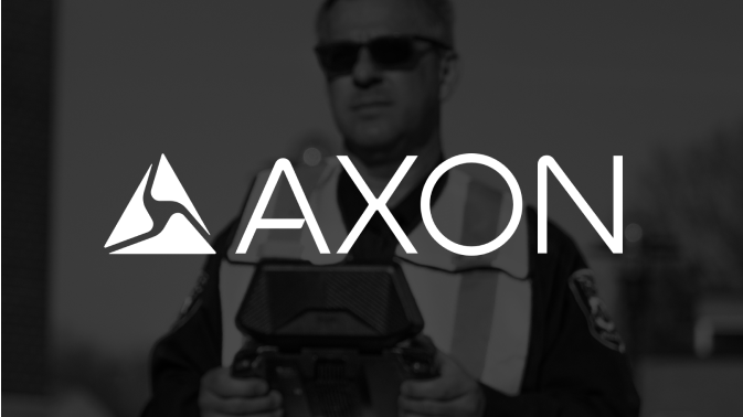 person flying drone with axon logo over the top