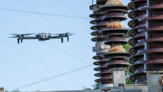 Skydio X10 drone inspecting substation components up close