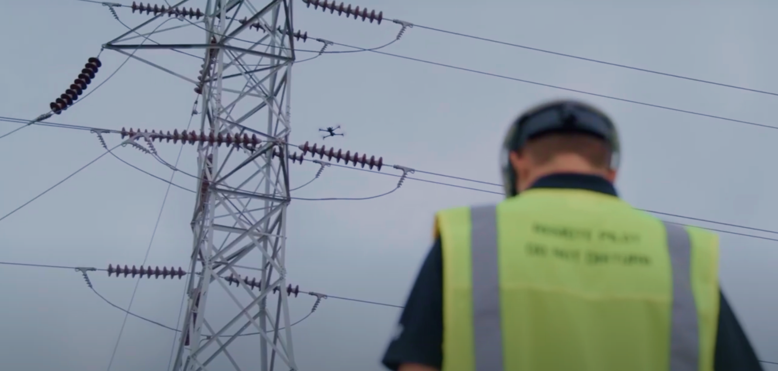 AEP worker using Skydio X10 to navigate and inspect large substation