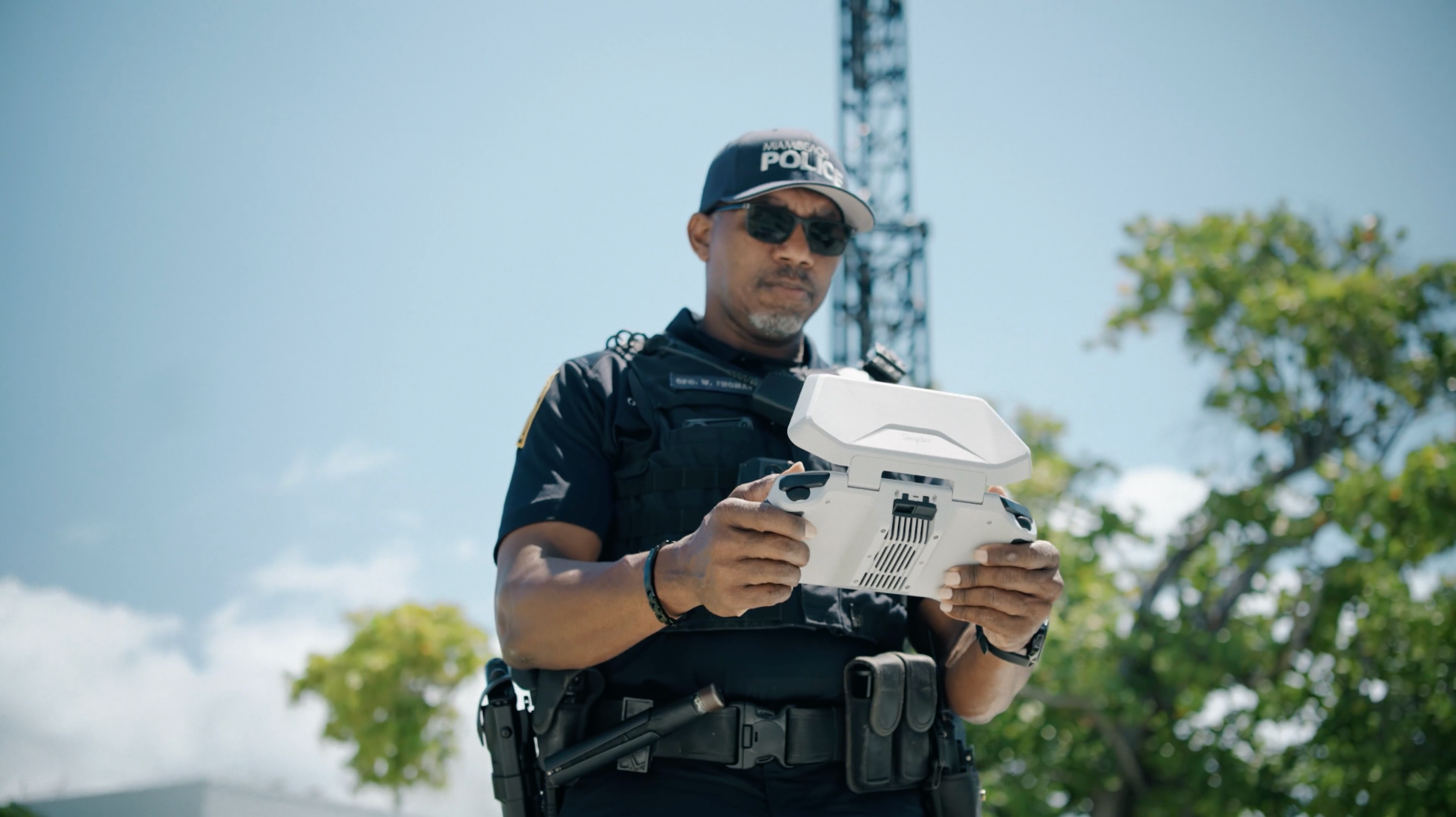 police officer with Skydio drone controller in hand