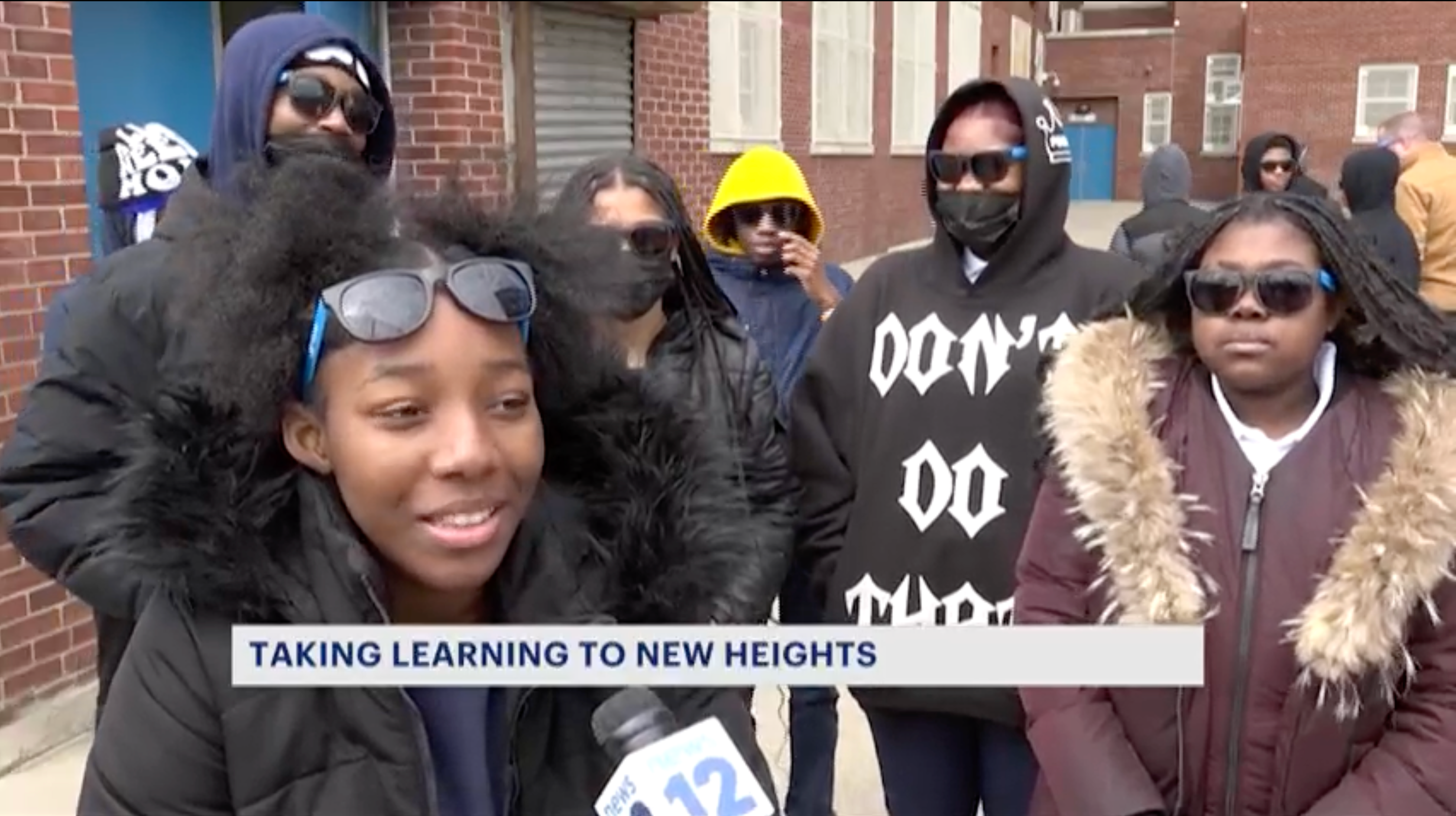 students talking to news reporter about flying Skydio drones at Skydio for All sponsored Brooklyn Youth Fly Day at Lamad Academy