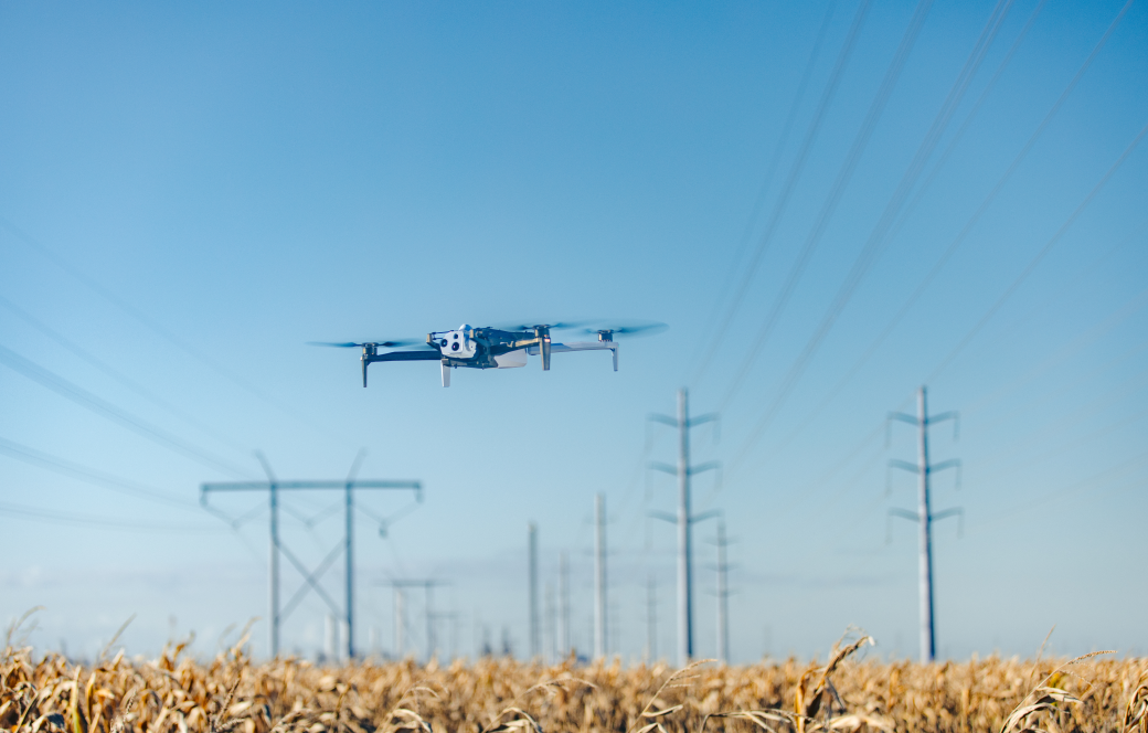 Skydio X10 flying over vast cornfield