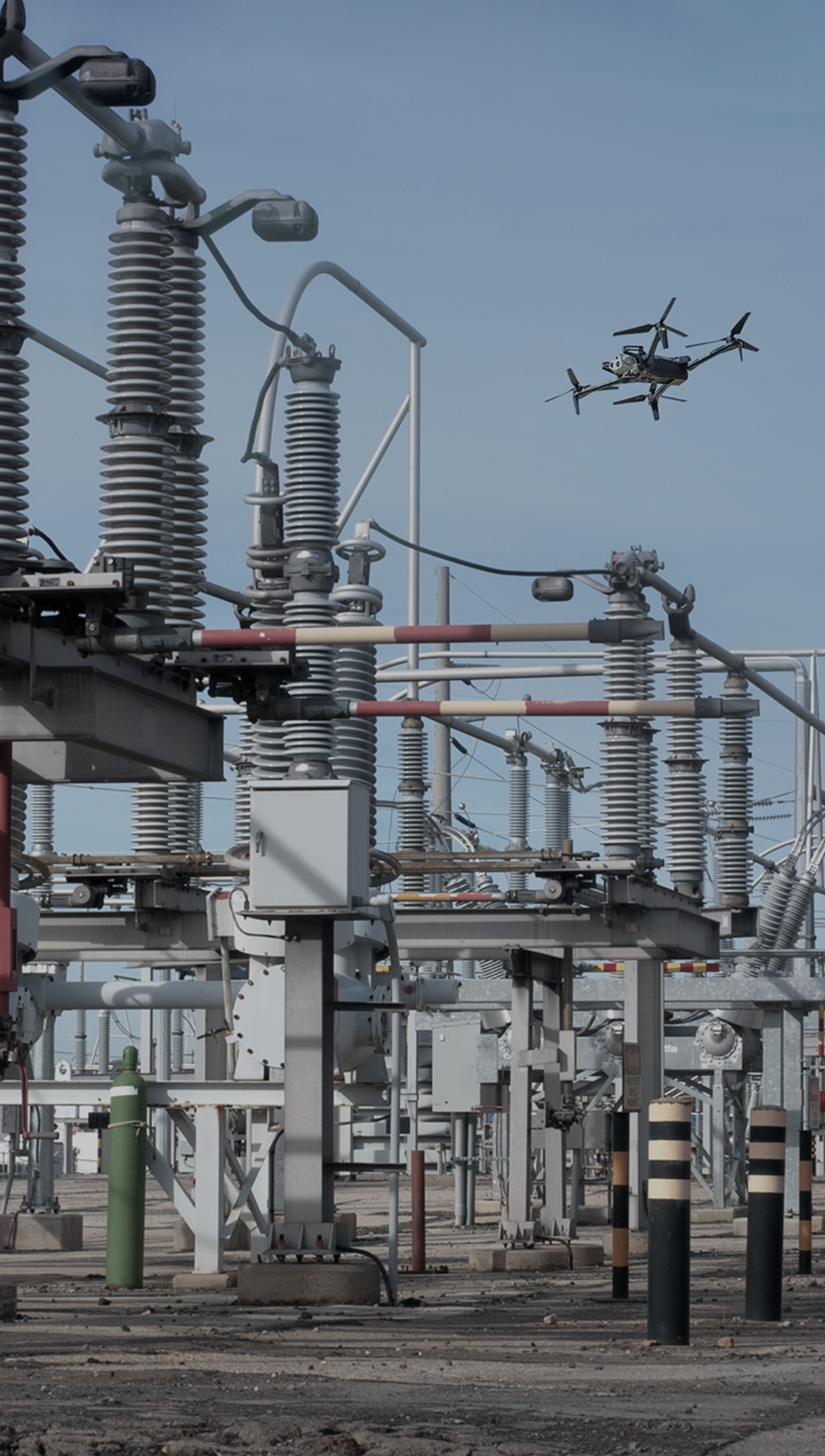 Skydio X10 drone flying over a transformer